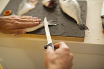 Fiskars_Kitchen_Lifestyle_Cutting board_Filleting knife_fish